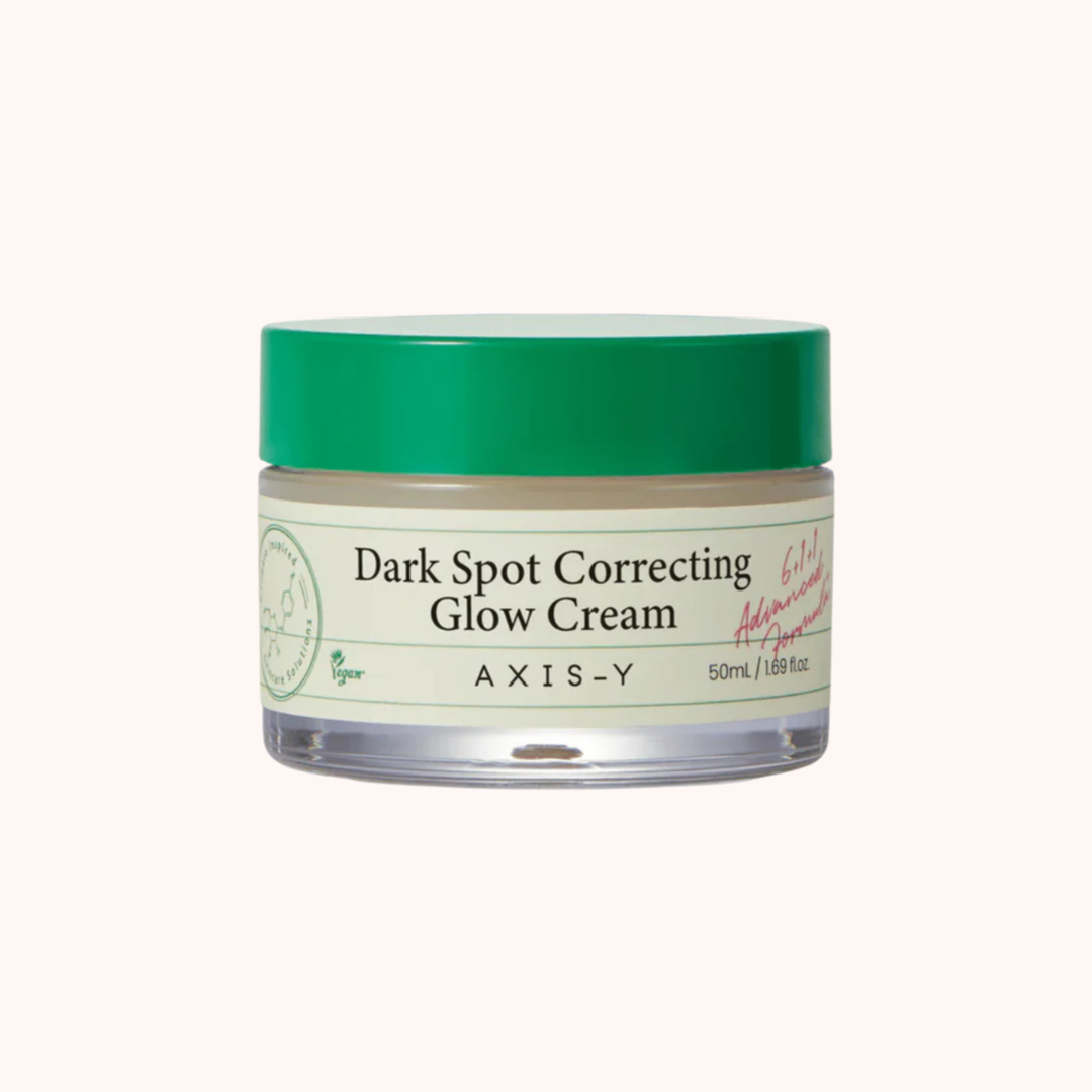 Jar of Axis-Y Dark Spot Correcting Glow Cream with green lid on a white background