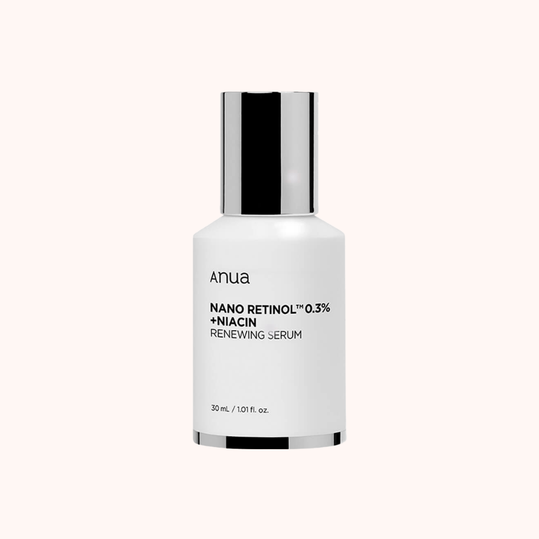 A pump bottle of Anua Nano Retinol 0.3% + Niacin Renewing Serum with a white and silver label design.