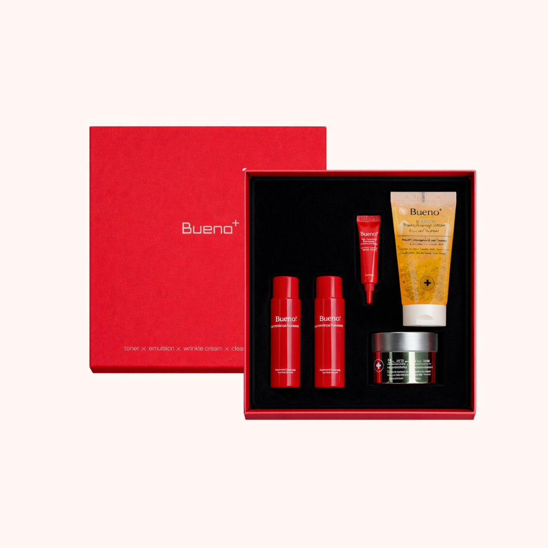 Cosmetic set with red and orange products in a red box labeled &