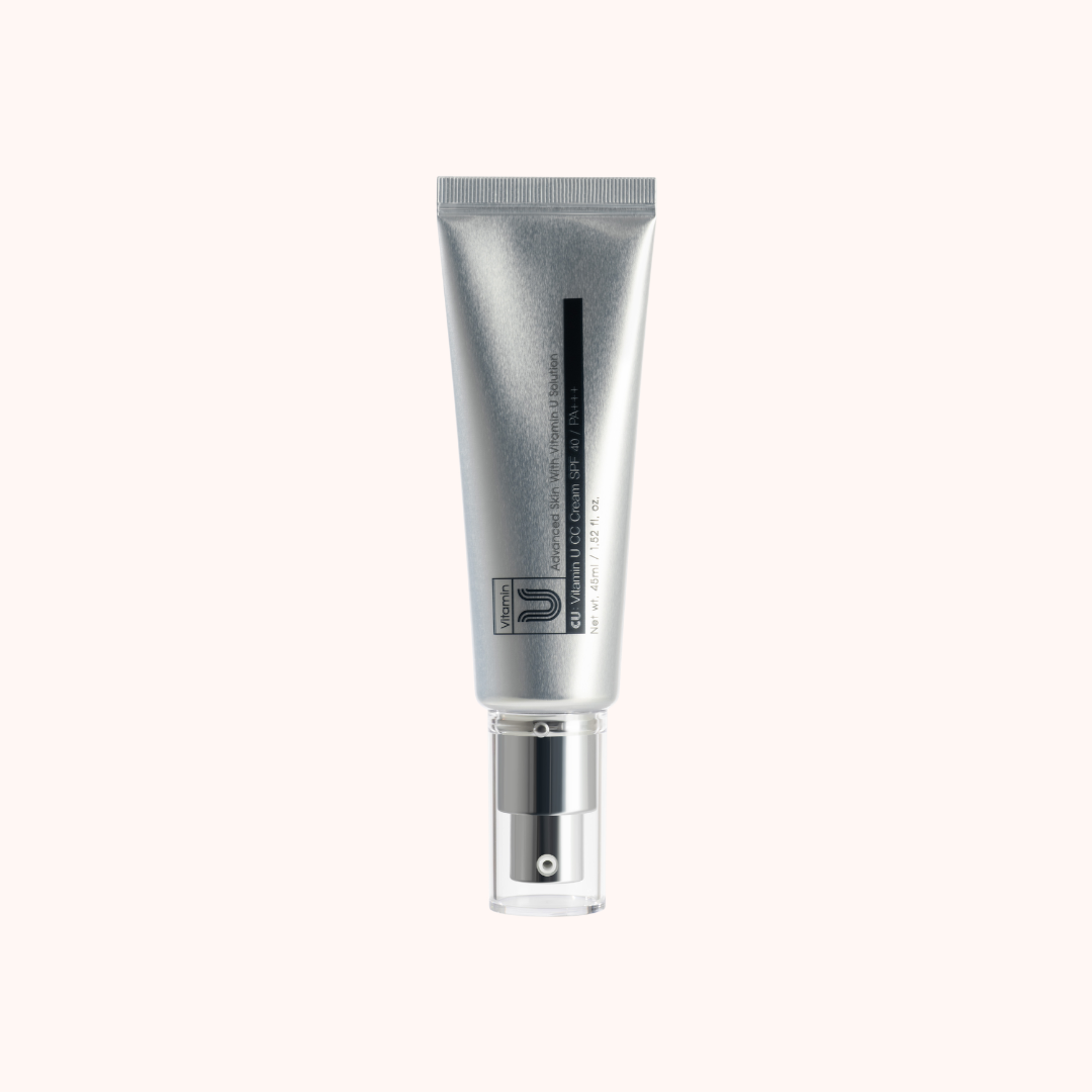Silver tube with a spray nozzle on a white background