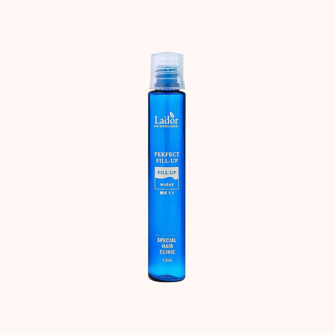 Blue bottle of Lador Perfect Fill-Up on a white background