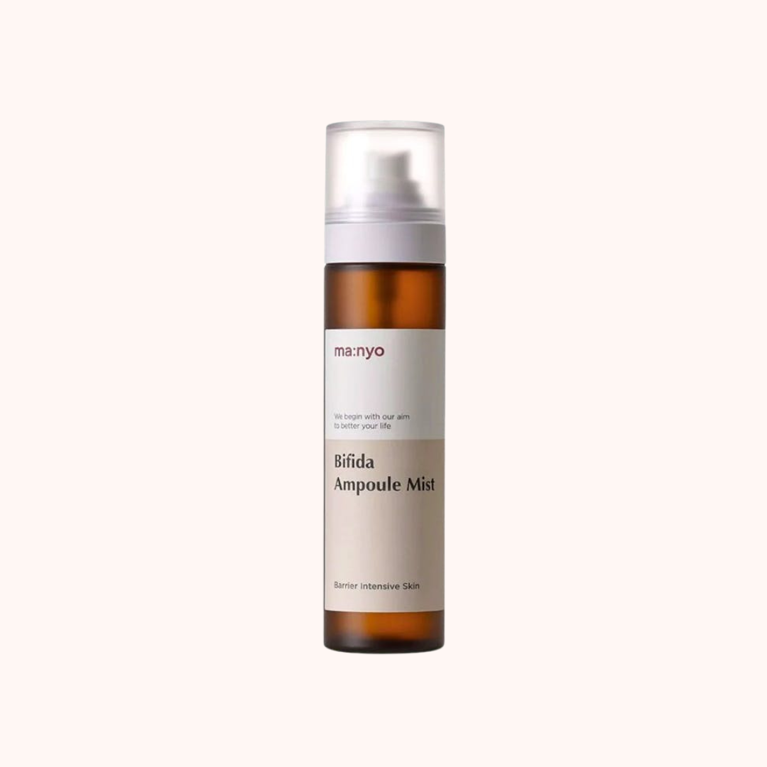 A pump bottle of Ma:nyo Factory Bifida Ampoule Mist with a beige label and white text.