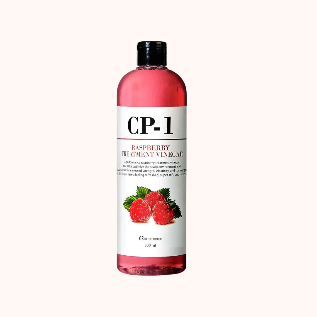 A bottle of Esthetic House CP-1 Raspberry Treatment Vinegar with a volume of 500ml. The bottle is transparent with a pink label featuring raspberries and text indicating the active ingredient.