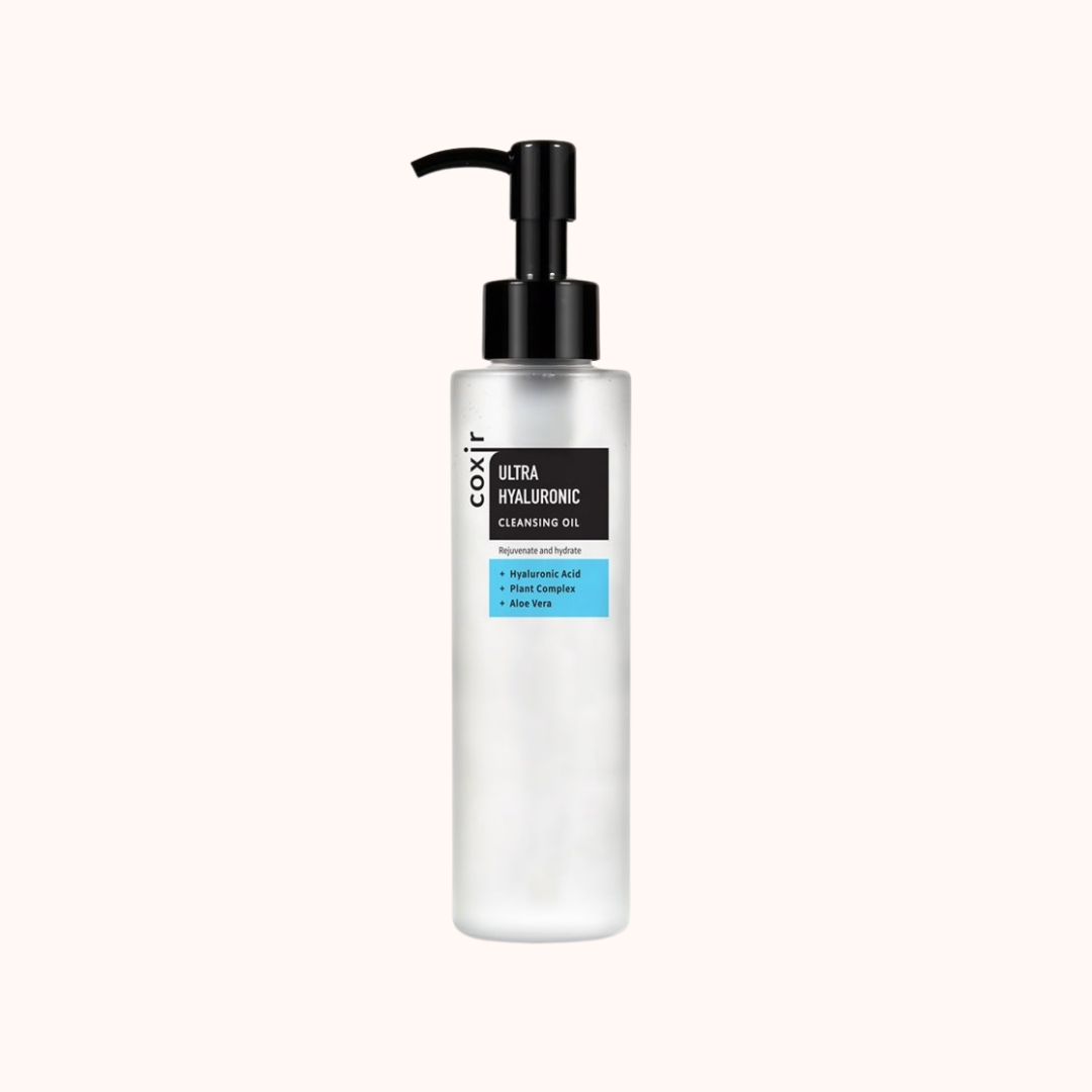 A pump bottle of Coxir Ultra Hyaluronic Acid Cleansing Oil against a white background.