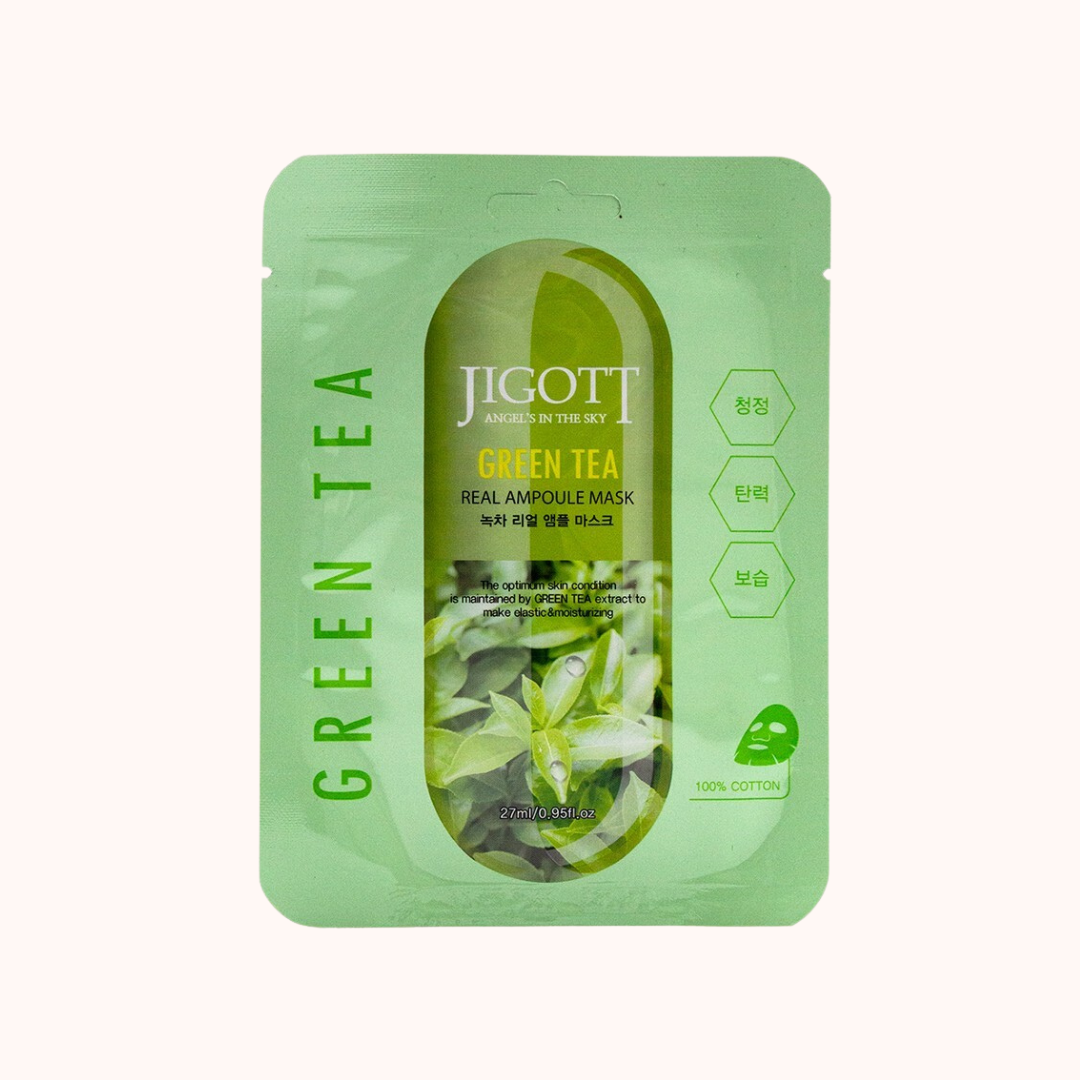 Packaging of Jigott Green Tea Real Ampoule Sheet Mask with a visible green tea plantation image and product details.