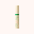 Skincare product tube with green label on a white background