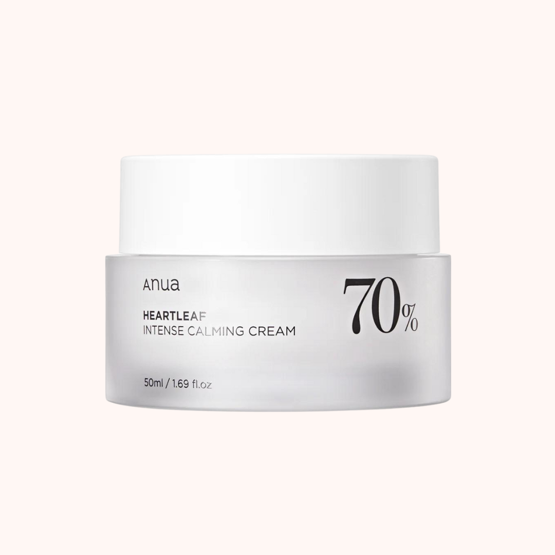 A white jar of Anua Heartleaf Intense Calming Cream with black and green text detailing the product name and the percentage of Houttuynia cordata extract.