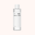 A white bottle labeled &