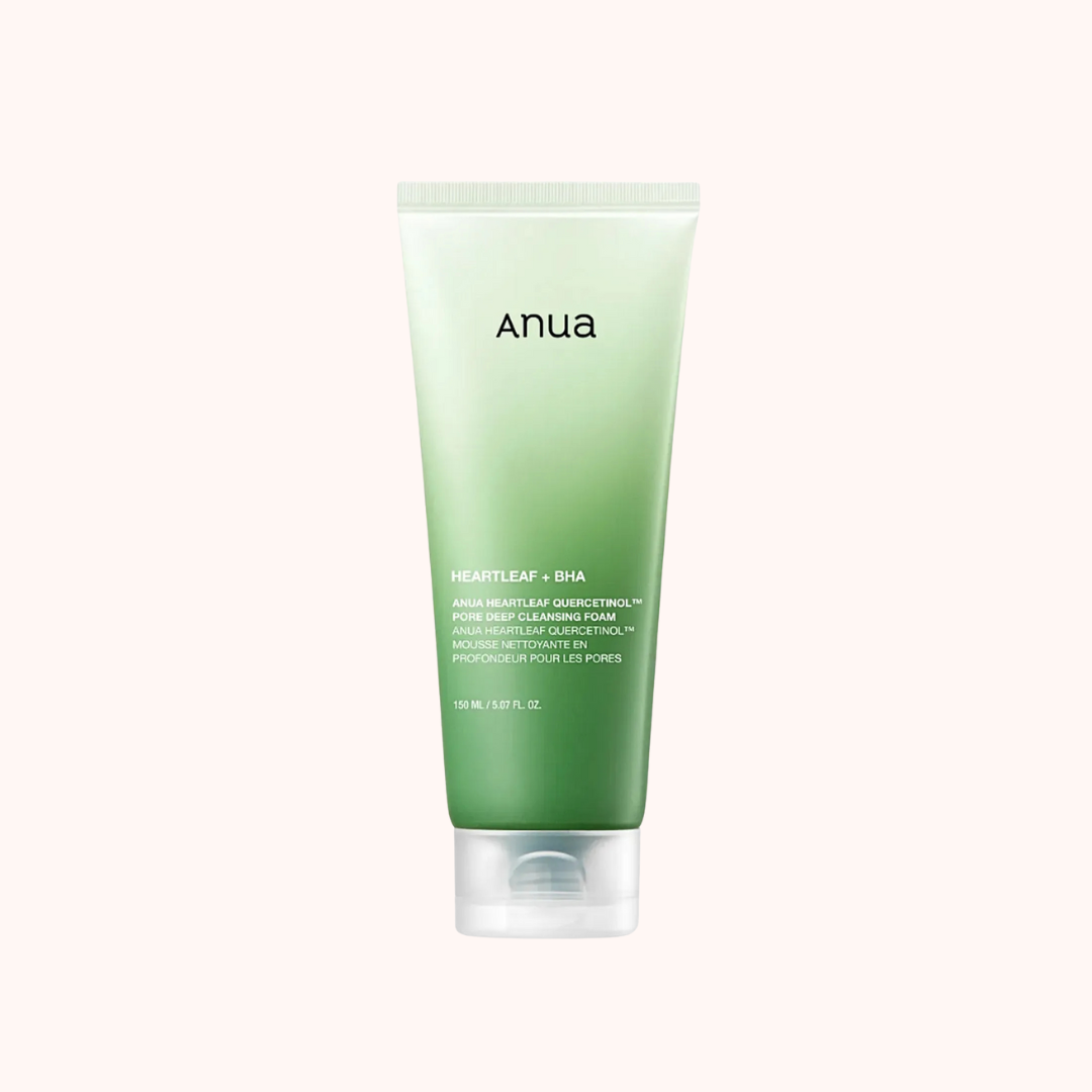 Green tube of anua product on a white background