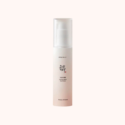 A pump bottle of Beauty Of Joseon Ginseng Moist Sun Serum with SPF50+/PA++++ label, predominantly in a light skin tone with minimalist design.
