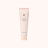 Beauty of Joseon Revive Flaming Moisturizer Glowing Cream in a pale pink squeeze tube, centered on a very light cream background.