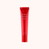 Red skincare tube labeled &