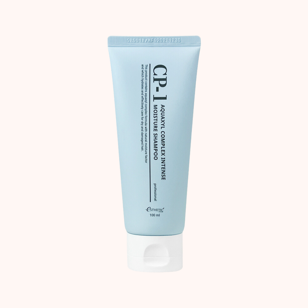 A tube of CP-1 Esthetic House Aquaxyl Complex Intense Moisture Shampoo 100ml, light blue packaging with text.