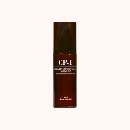 Brown bottle of CP-1 Keratin Concentrate Ampoule on a white background