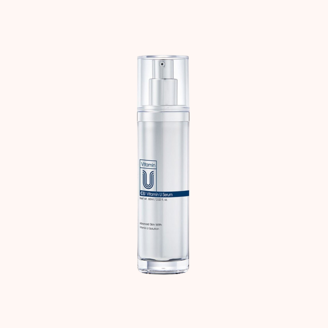 Skincare serum bottle with pump on a white background