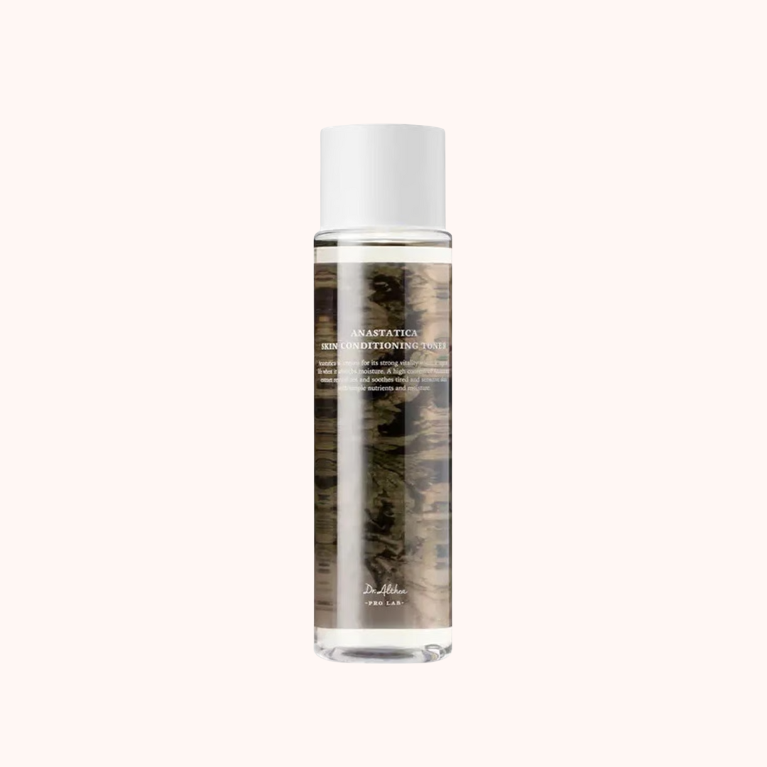 Skincare bottle with a white cap on a white background
