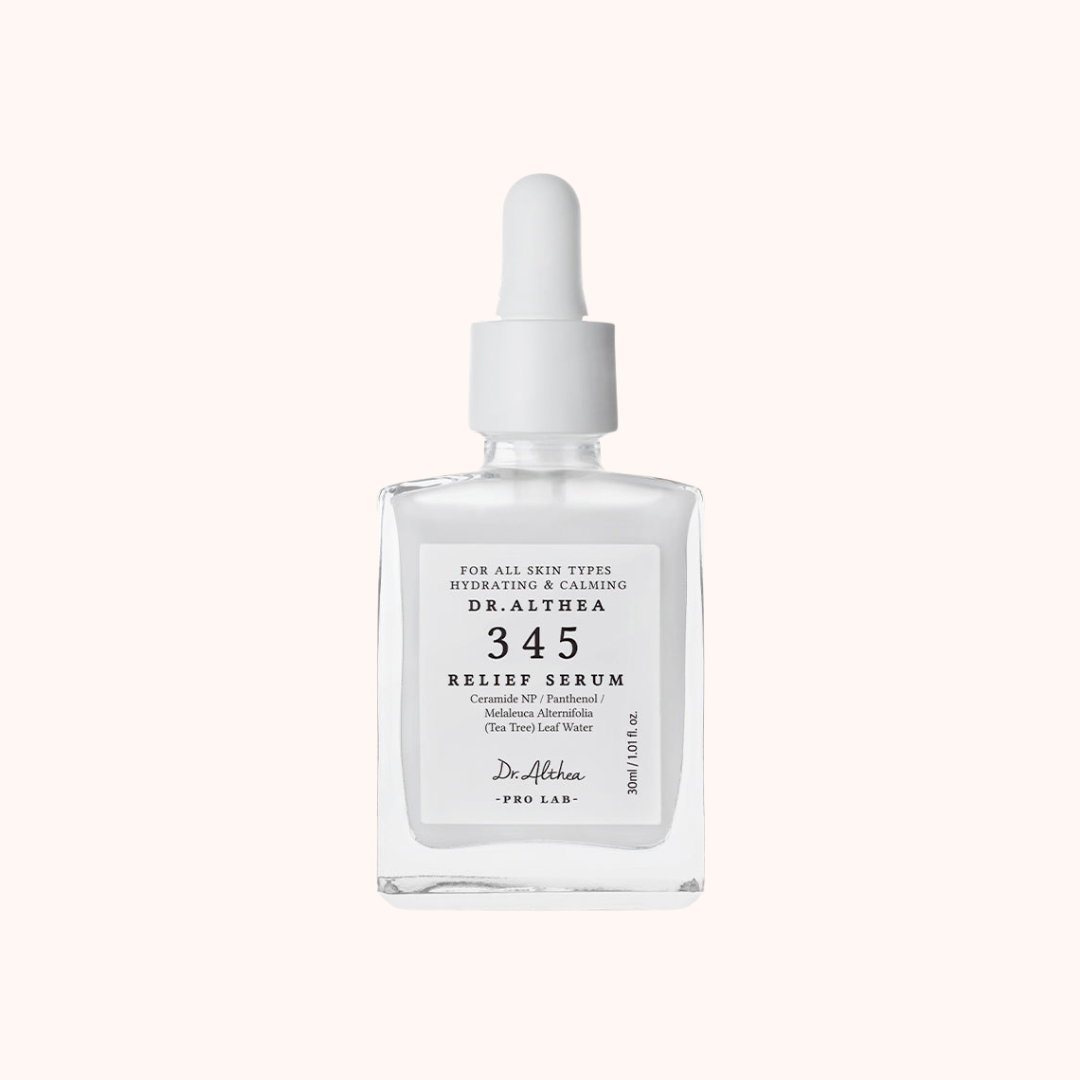 A clear glass dropper bottle of Dr. Althna 345 Relief Serum with a white cap and white label, centered on a pale cream background.