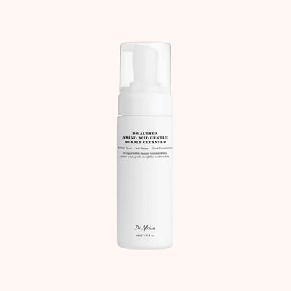 A white pump bottle of Dr. Althaea Amino Acid Gentle Bubble Cleanser, shown against a solid pale pink background.