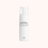 A white pump bottle of Dr. Althaea Amino Acid Gentle Bubble Cleanser, shown against a solid pale pink background.