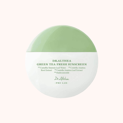 Green tea fresh sunscreen container with branding on a white background