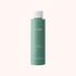 Green bottle with white cap labeled &