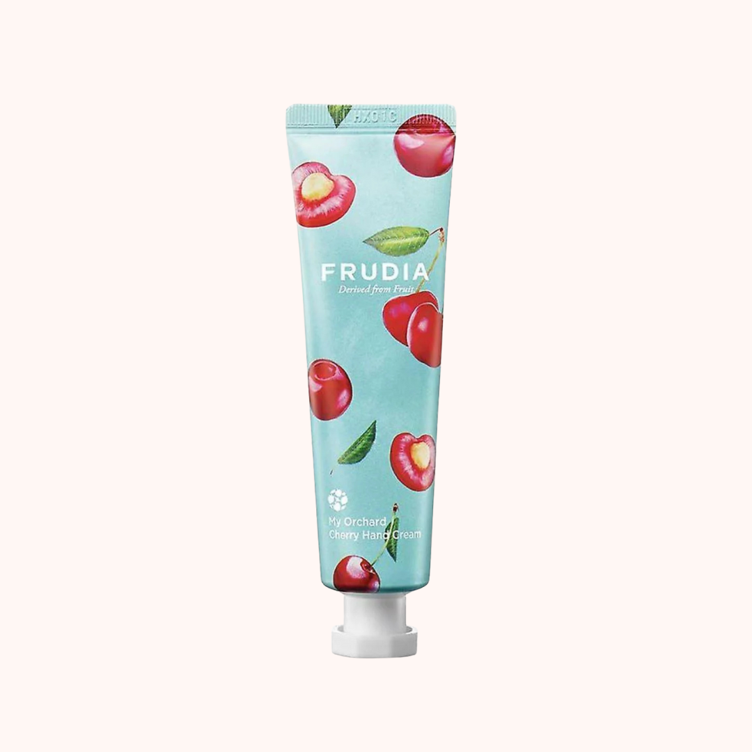 Frudia cherry hand cream tube on a white background