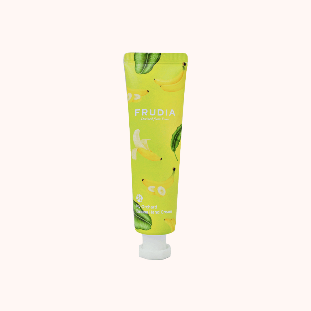 Tube of Frudia product with banana design on a white background