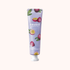 Frudia hand cream tube with fruit illustrations on a white background