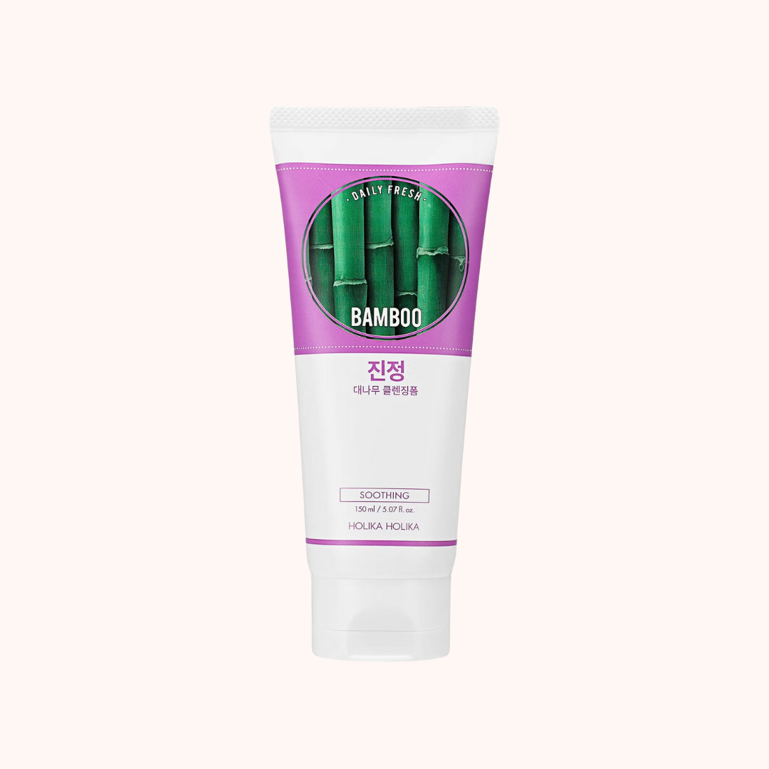 A tube of Holika Holika Daily Fresh Bamboo Cleansing Foam with a purple and green label featuring bamboo imagery.