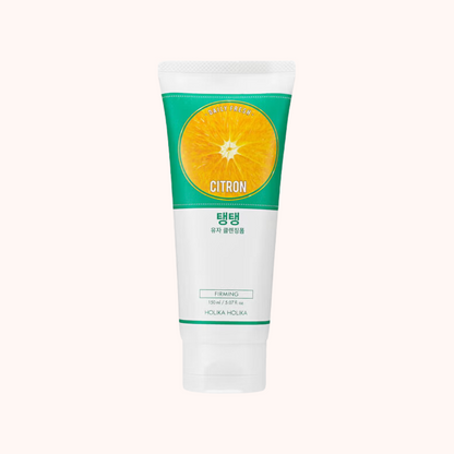 A tube of Holika Holika Daily Fresh Citron Cleansing Foam with a green and white label, featuring an image of a slice of orange.