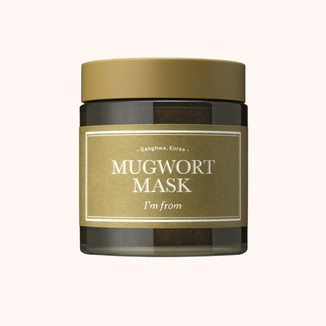 Jar of Mugwort Mask with gold lid and label on a white background