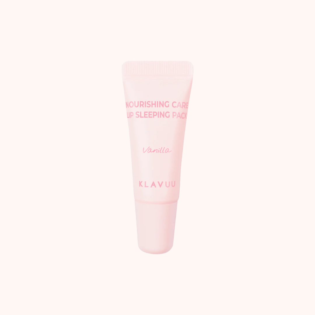 A light pink squeeze tube of Klavuu Nourishing Care Lip Sleeping Pack in Vanilla scent, centered on a very pale pink background.