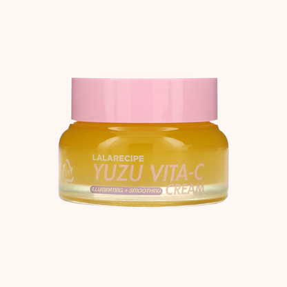 Jar of Yuzu Vita-C cream with pink lid on a white background