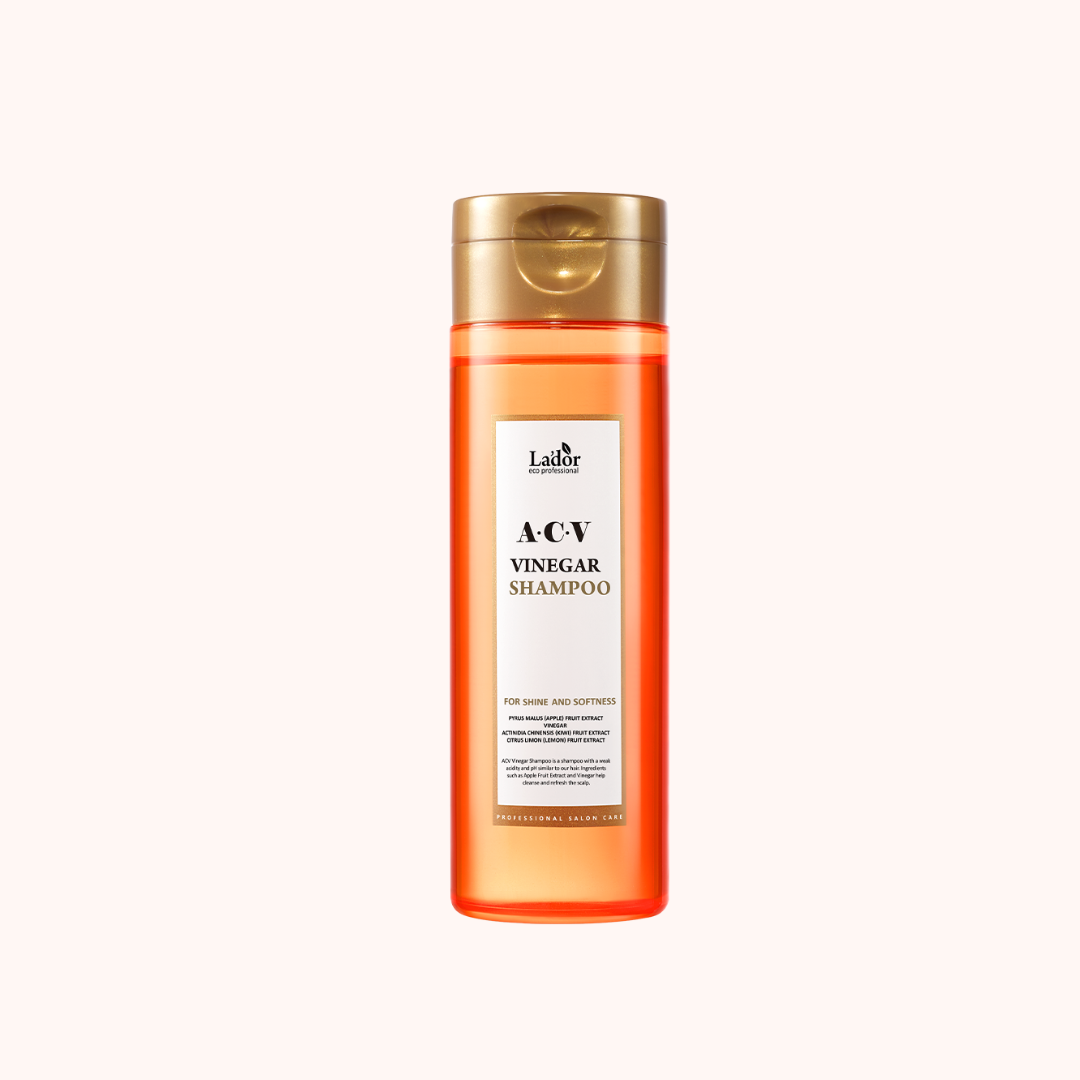 A bottle of Lador Professional Hair Care ACV Vinegar Shampoo with a clear label displaying the product name and the active ingredients, set against a white background.