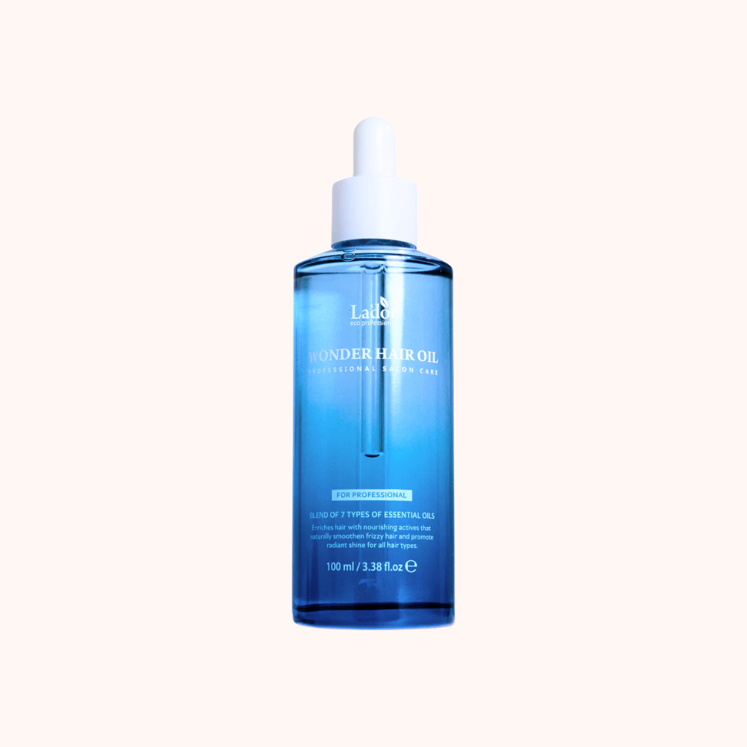 Blue bottle of Laneige Wonder Hair Oil on a white background