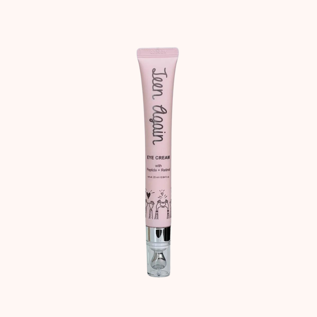 A tube of Look At Me Teen Again Peptide+Retinol Eye Cream with a pink label and a metal applicator wand.
