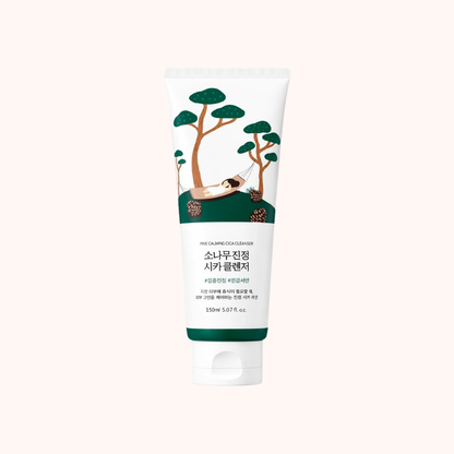 A 120ml squeeze tube of COSMOPOLIS CLEANSENER cleansing lotion, featuring a white tube with a green and brown forest illustration and Korean text, set against a solid pale pink background.