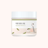A cosmetic cream jar with a white lid and a white label featuring Korean text and a minimalist illustration of a person climbing a ladder next to a beaker. The label also has a thin olive green stripe and small green leaf shapes, set against a solid pale pink background.
