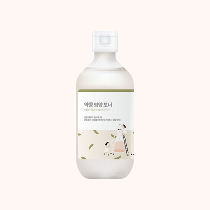 White bottle with a label on a white background