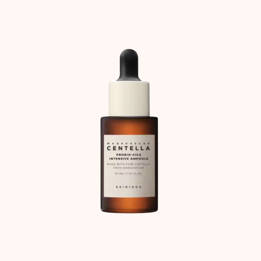 Skincare dropper bottle with a white label on a white background