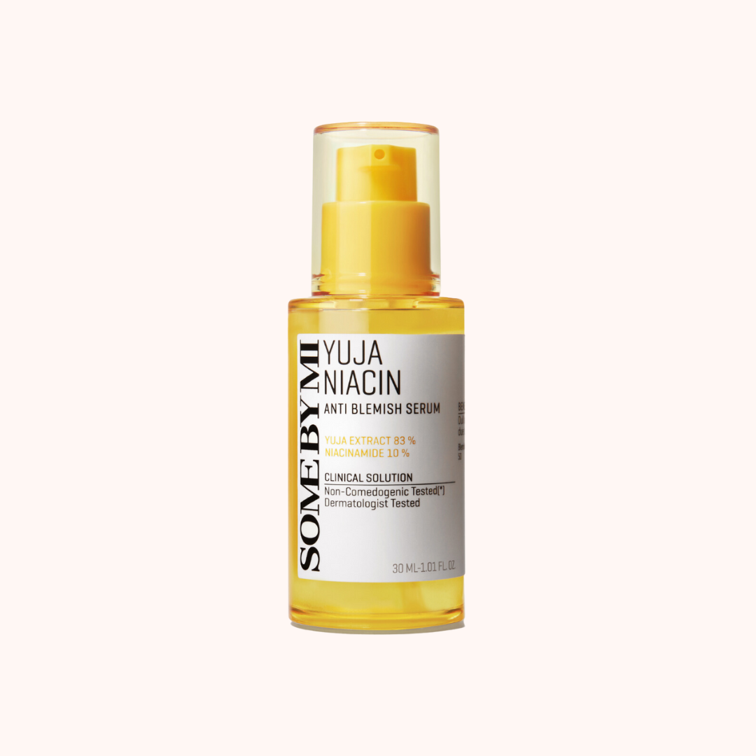 A bottle of Some By Mi Yuja Niacin Anti Blemish Care Serum with yellow packaging.