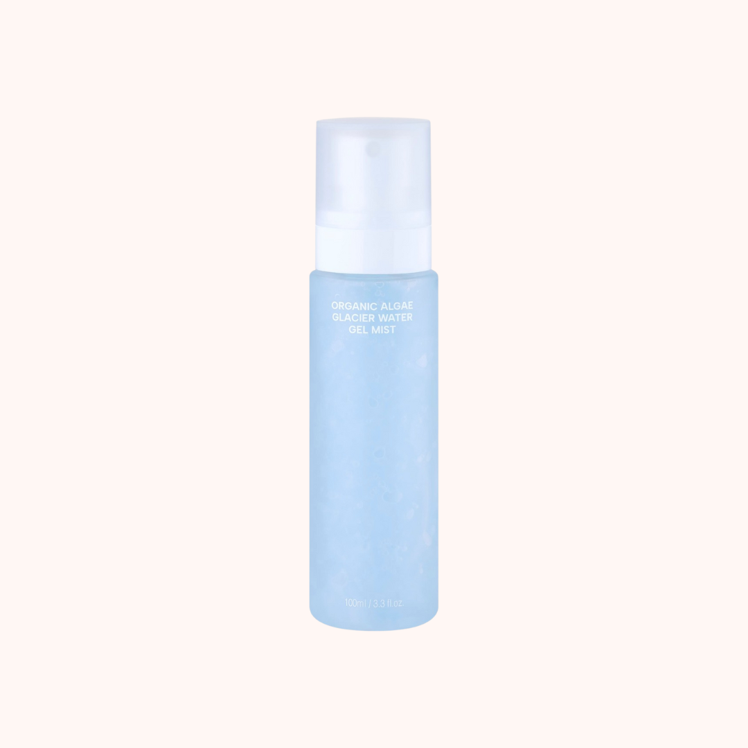 Blue bottle with white cap on a light pink background
