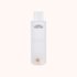 White bottle of organic pear blossom essence toner on a white background