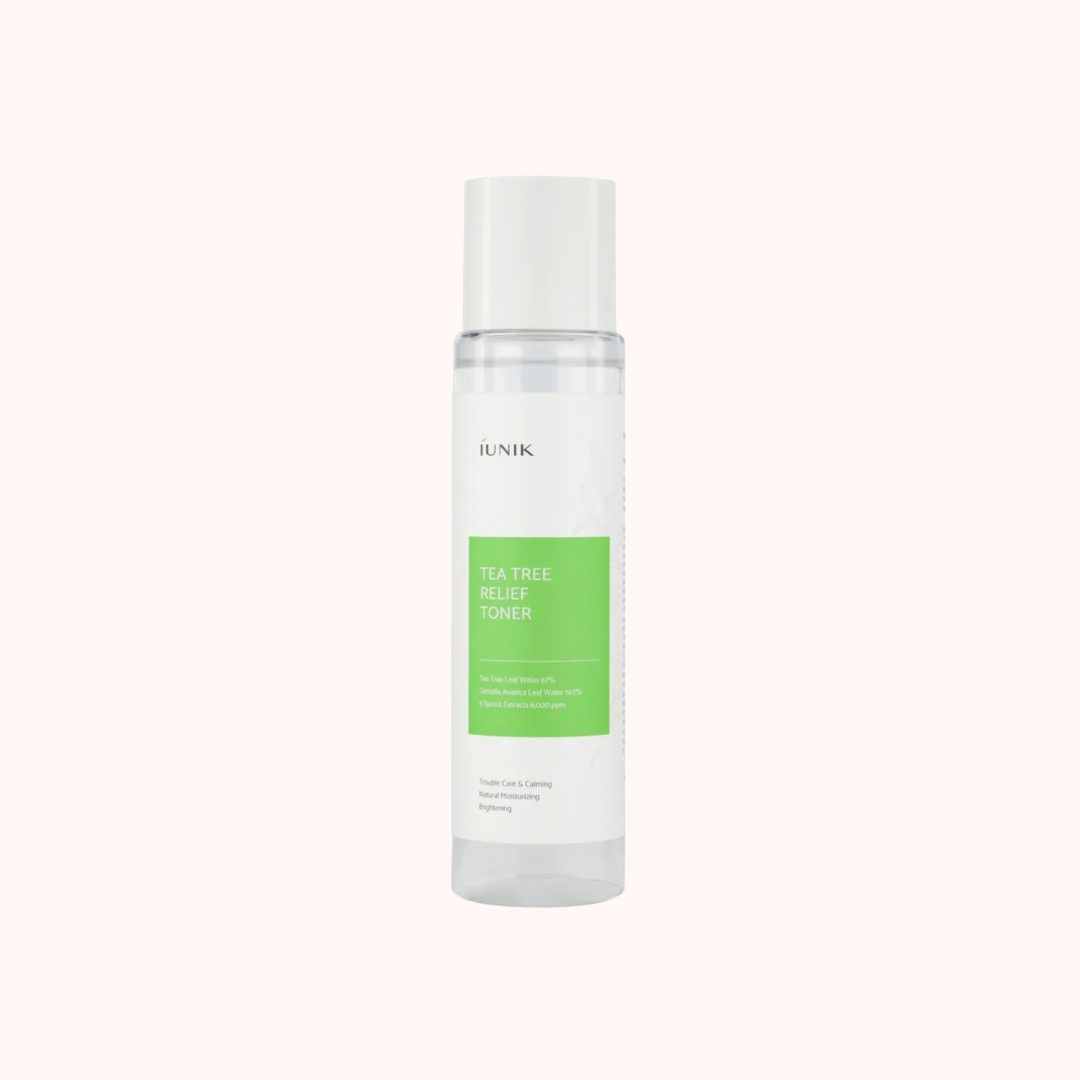 Skincare bottle with green label on a white background
