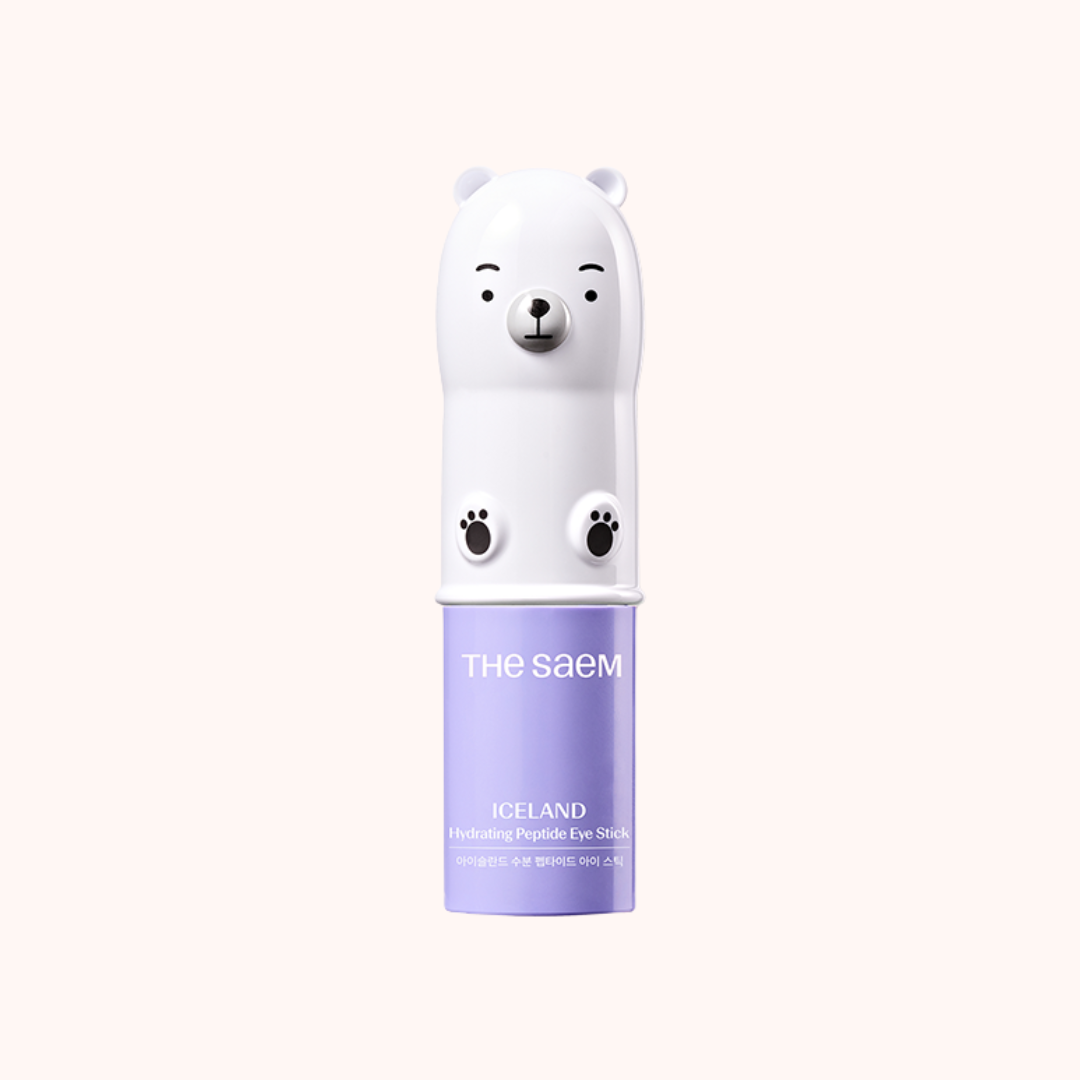 The Saem Iceland hydrating peptide eye stick with a bear design on a light pink background