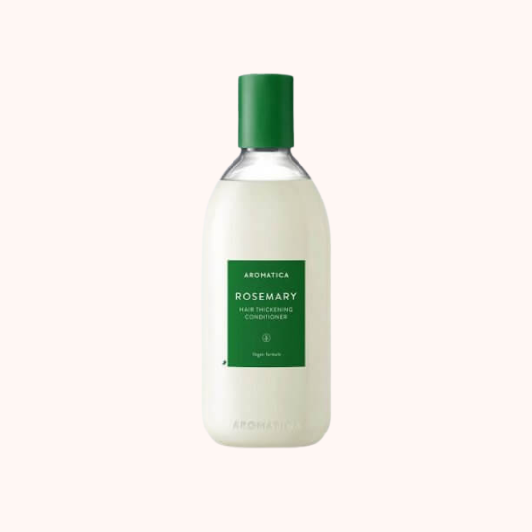 A bottle of Aromatica Rosemary Hair Thickening Conditioner with a white body and a green cap, labeled with the brand and product name.